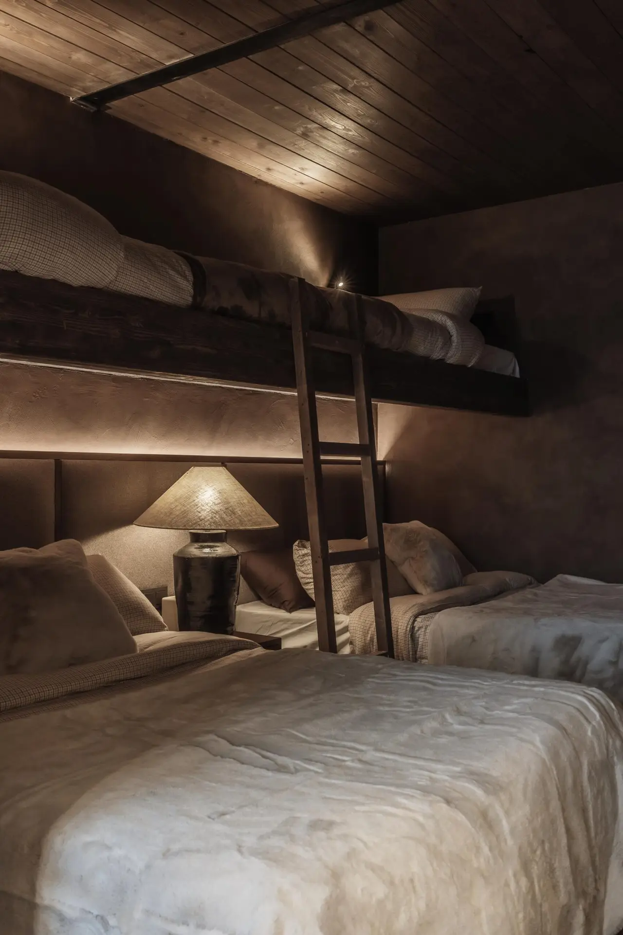 Bunk beds above the double bed